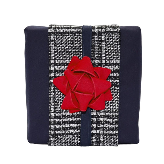Reusable gift wrapping Vice-Versaᴷᴵᵀ - Black, silver, and white checkered band on a navy blue Furoshiki and a red gift bow